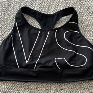 VSX Black Sports Bra with White Lettering and Peekaboo detail